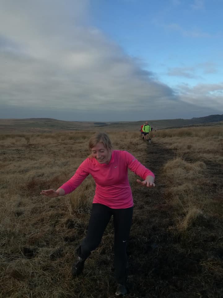Julie running in a bog